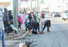 
			
				                                Parade watchers picking up candy on the street thrown from the parade floats going by during the Red Springs Christmas parade Saturday.
 
			
		