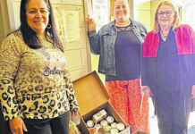 
			
				                                Left to right, Phoebe Harris, education program director and coordinator of the RCC food pantry, SHOP student Amy Jacobs and RCC counselor Susan Moore show some of the food collected by the college.
 
			
		